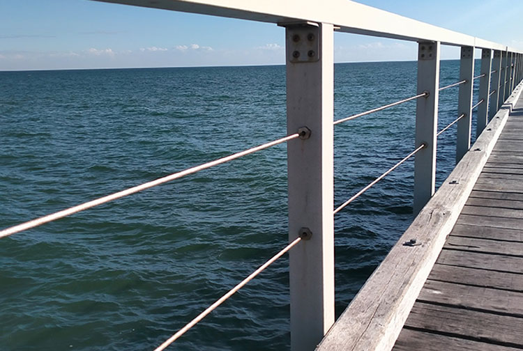 Fiberglass reinforced plastic railing in a seaside setting