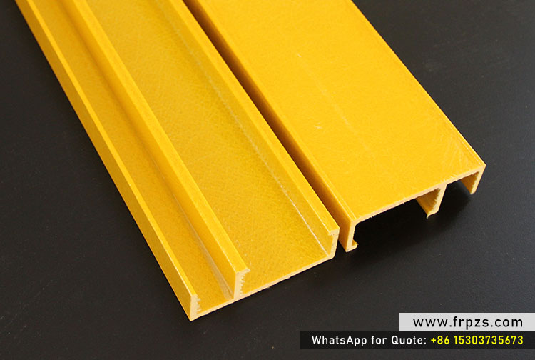 Close-up of two yellow FRP custom grooved profiles