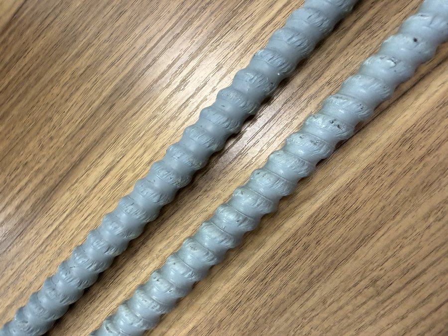 Genuine GFRP rebar close-up texture